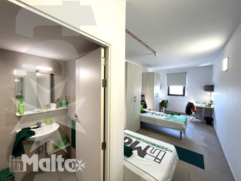 Room entrance and wardrobes - Campus inMalta Entrance and wardrobes in the twin room at Campus inMalta